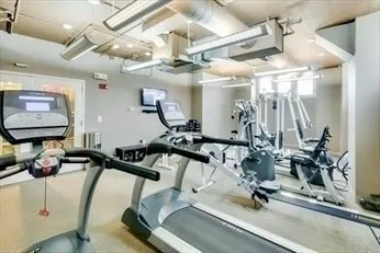 a view of a room with gym equipment