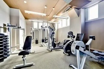 a view of a room with gym equipment