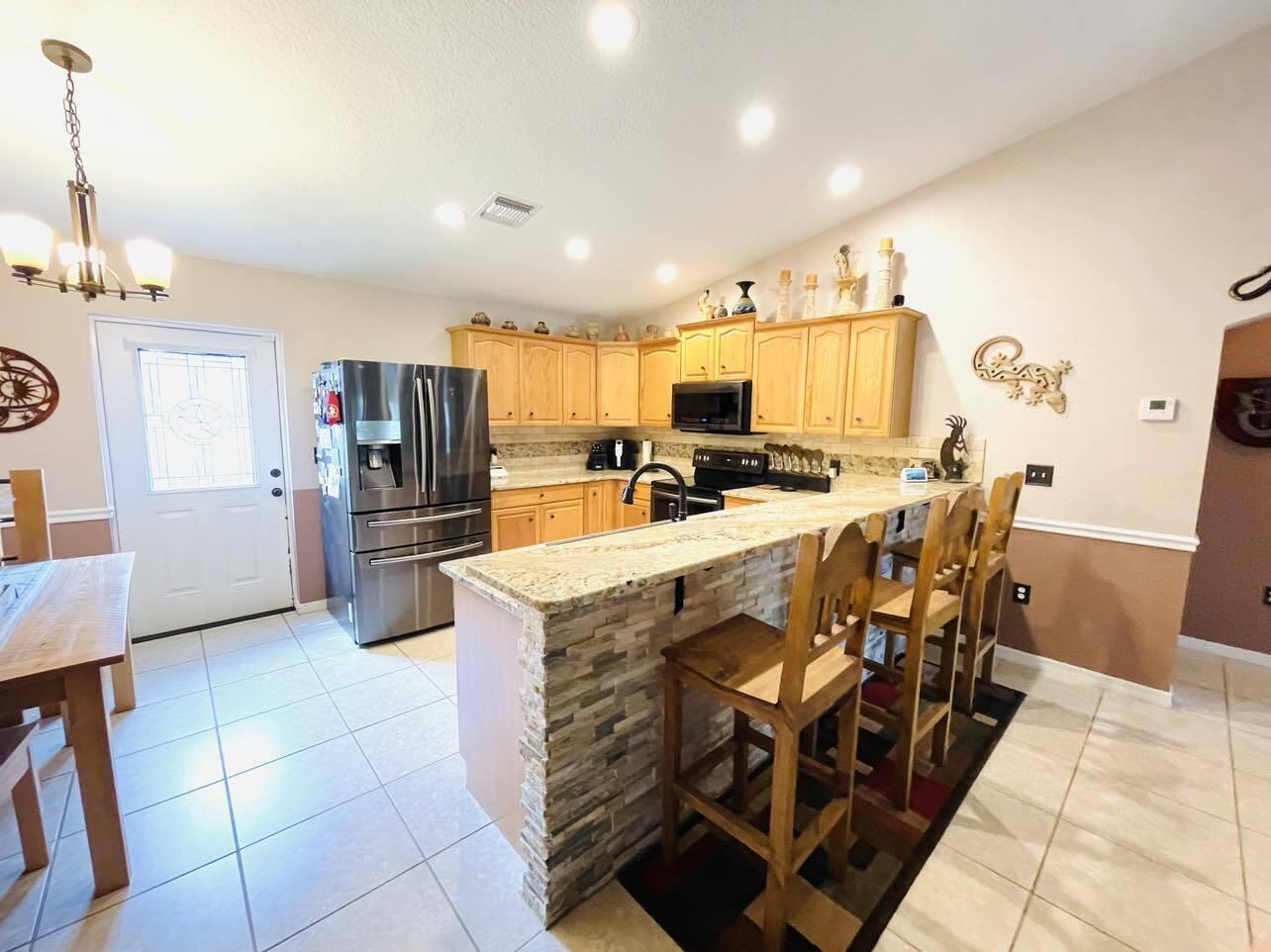 8888 Southeast 67th Way Okeechobee, FL 34974 - Photo 6 of 21 403607023_3725933257662648_1296496384046