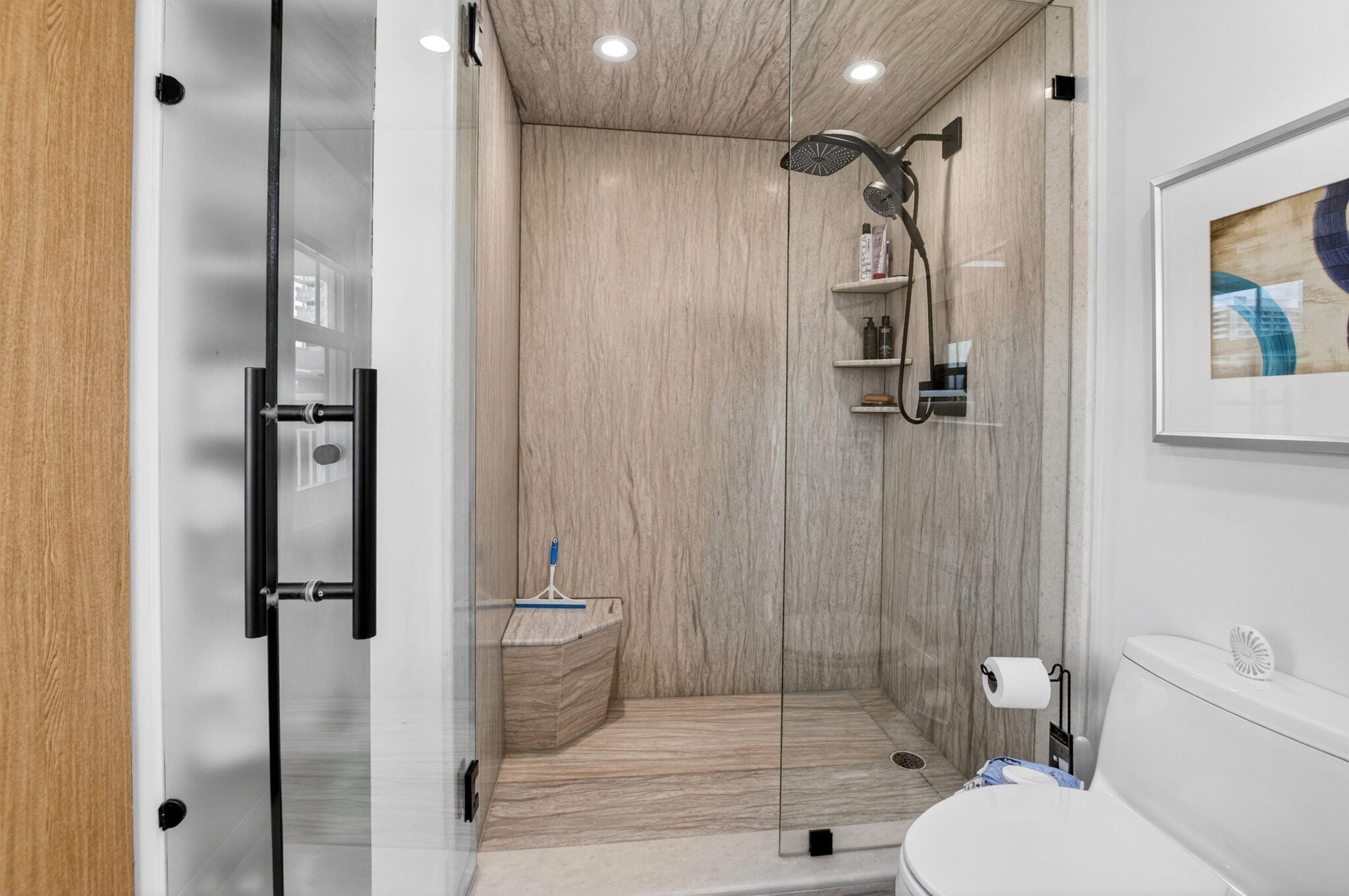 950 De Soto Road, Unit 5A Boca Raton, FL 33432 - Photo 60 of 98 a bathroom with a shower toilet and sink