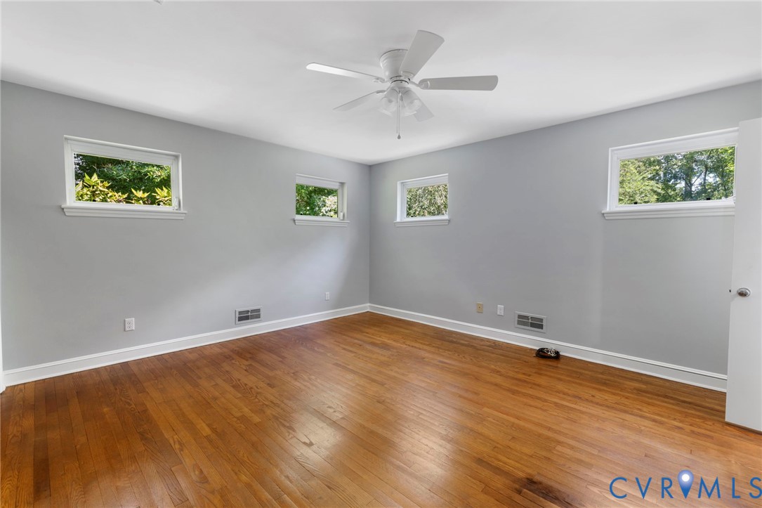7644 Cherokee Road Richmond, VA 23225 - Photo 17 of 31 Unfurnished room featuring wood-type flooring and