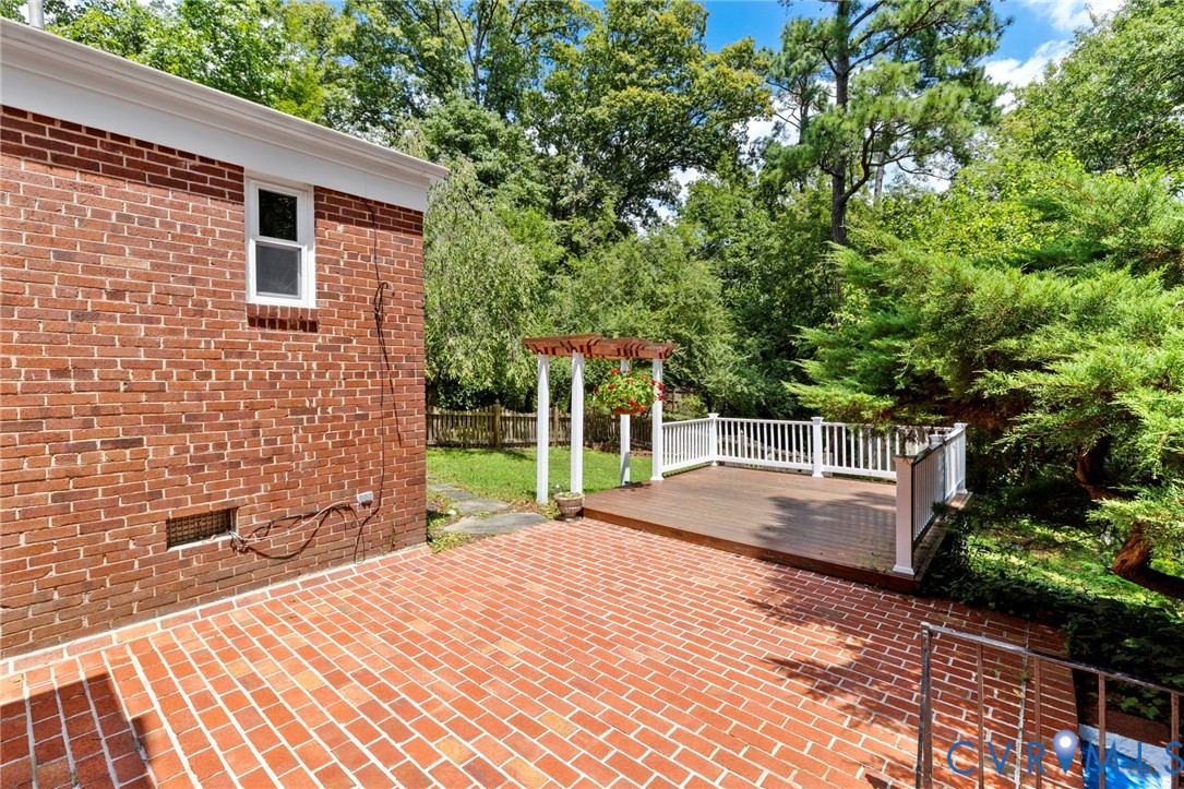 7644 Cherokee Road Richmond, VA 23225 - Photo 25 of 31 View of patio featuring a deck and a pergola