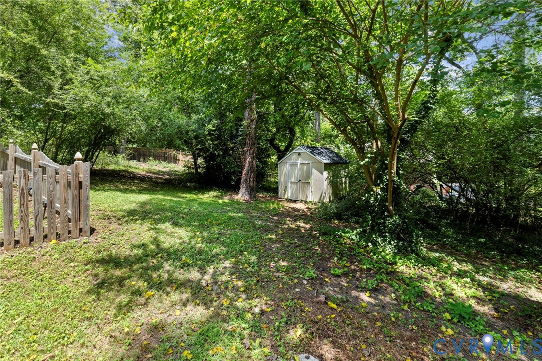 7644 Cherokee Road Richmond, VA 23225 - Photo 30 of 31 View of yard featuring a storage shed and view of