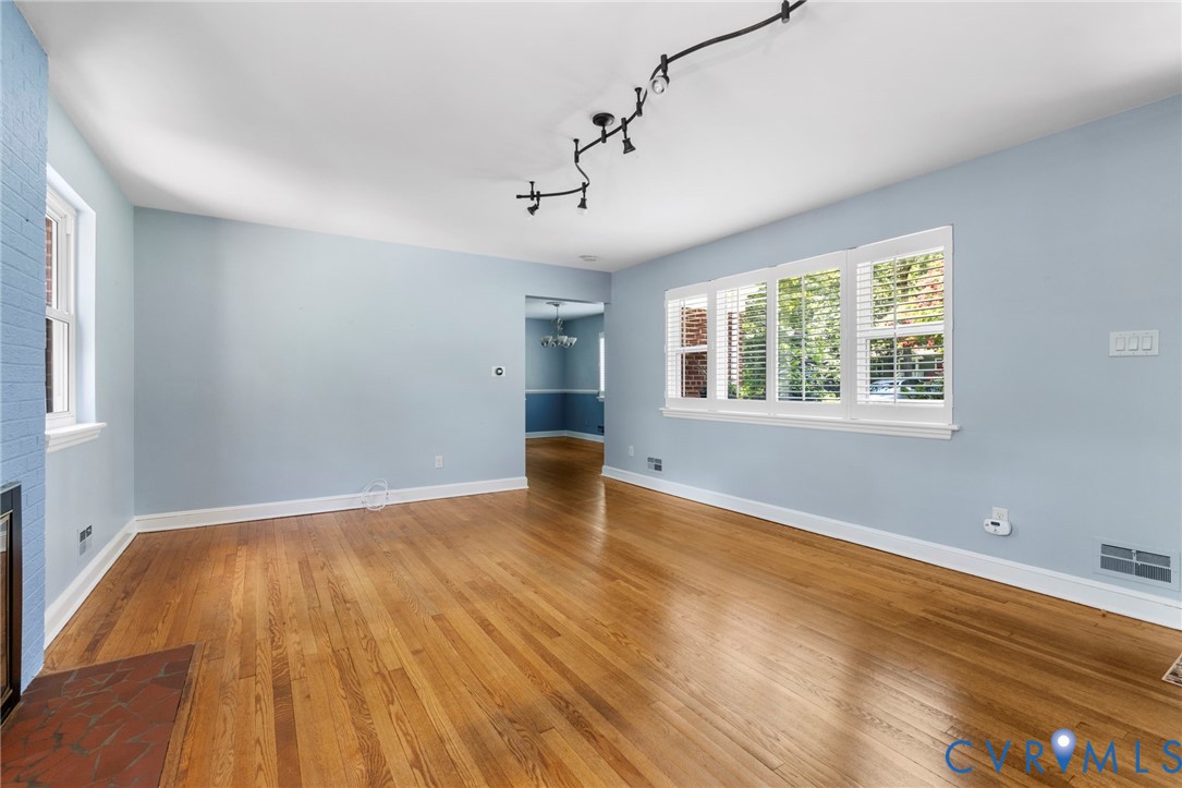 7644 Cherokee Road Richmond, VA 23225 - Photo 6 of 31 Unfurnished room with light wood-style flooring, a