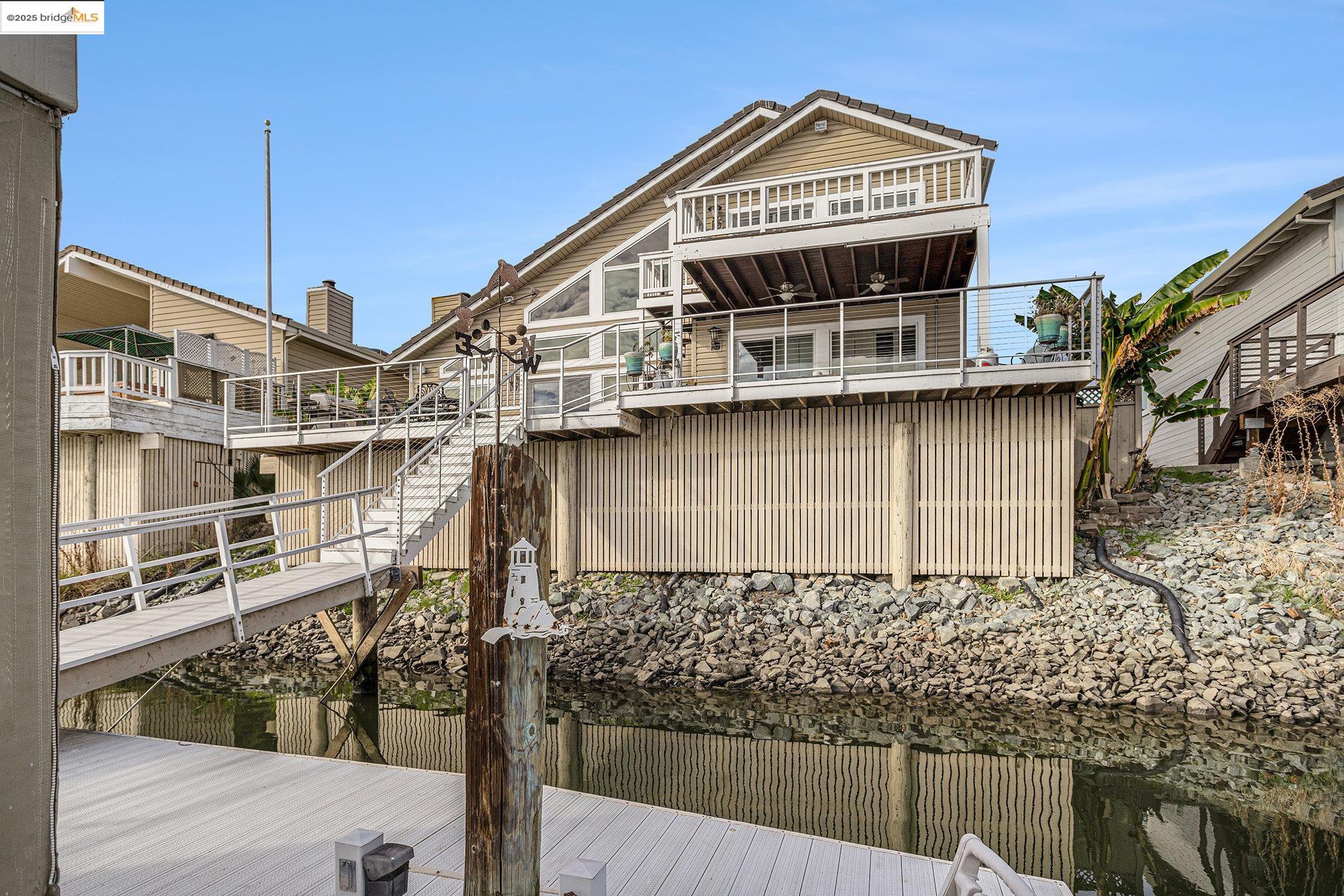 2011 Windward Point Discovery Bay, CA 94505 - Photo 13 of 19 a front view of a house with balcony
