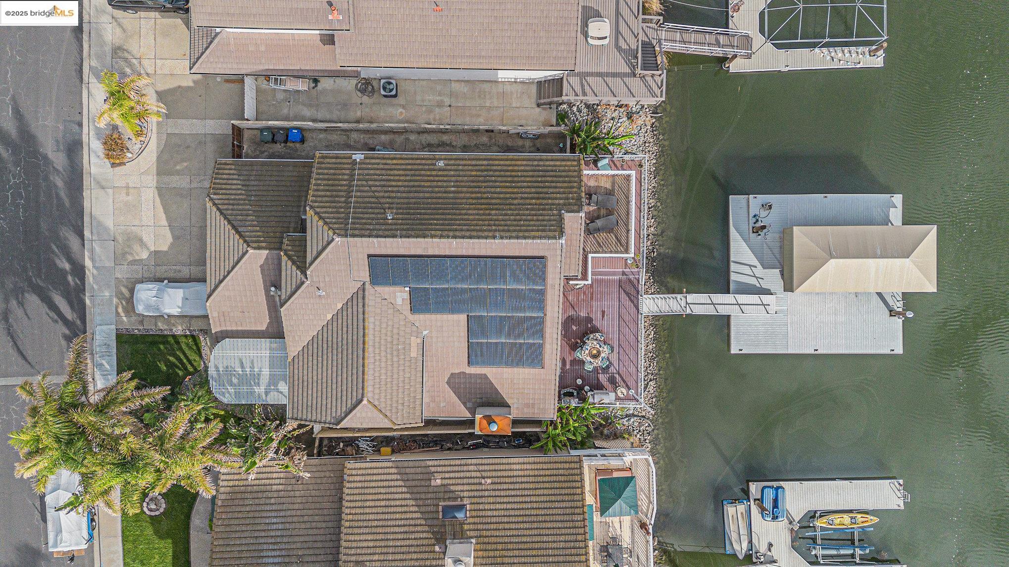 2011 Windward Point Discovery Bay, CA 94505 - Photo 17 of 19 a front view of a house with outdoor seating