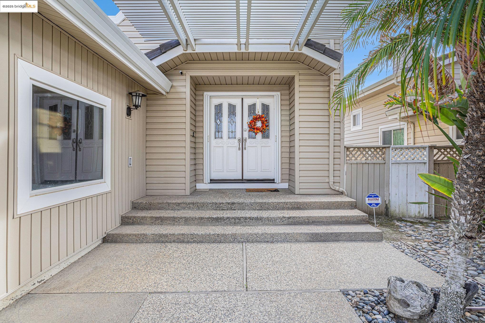 2011 Windward Point Discovery Bay, CA 94505 - Photo 4 of 19 a front view of a house with a window
