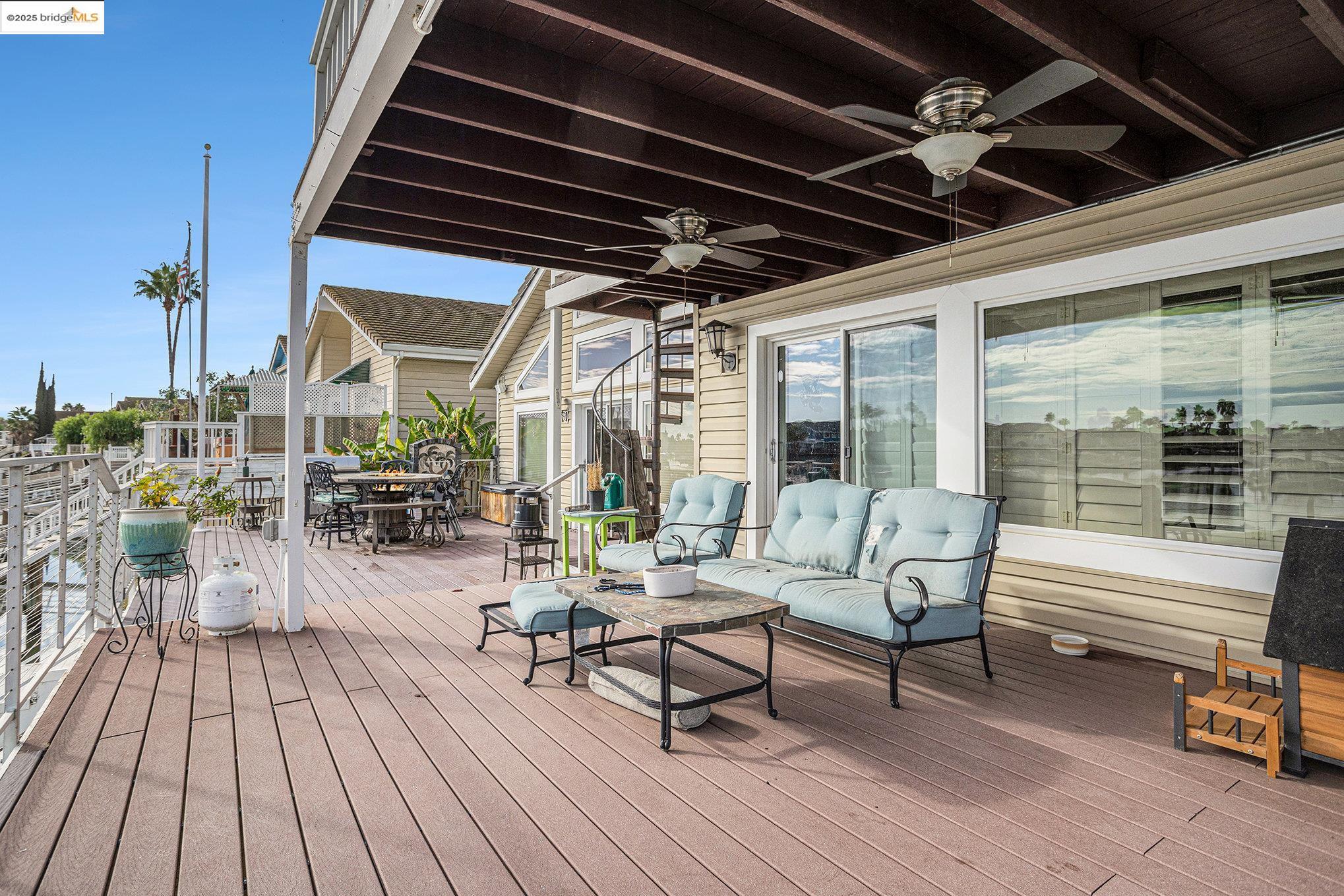 2011 Windward Point Discovery Bay, CA 94505 - Photo 6 of 19 a outdoor space with patio lots of furniture and wooden floor