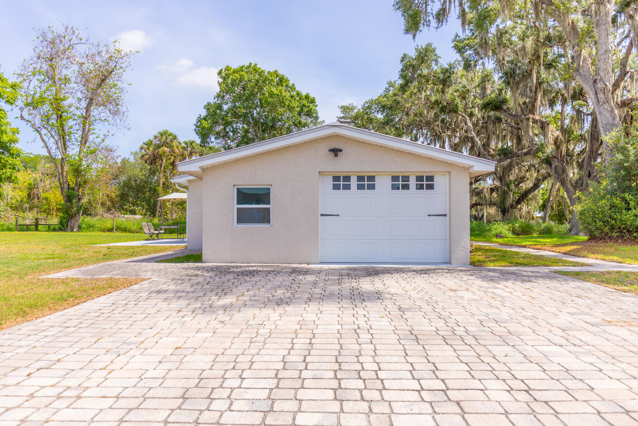 2675 Southwest 24th Avenue Okeechobee, FL 34974 - Photo 16 of 60 a view of a house with a yard