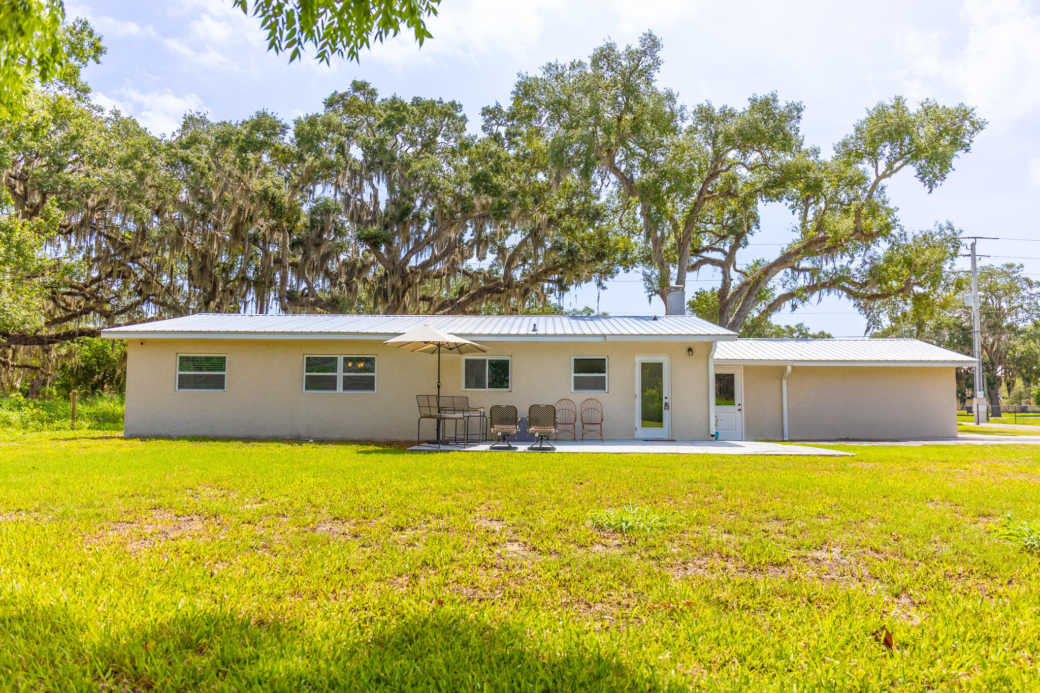 2675 Southwest 24th Avenue Okeechobee, FL 34974 - Photo 20 of 60 a view of a house with a yard