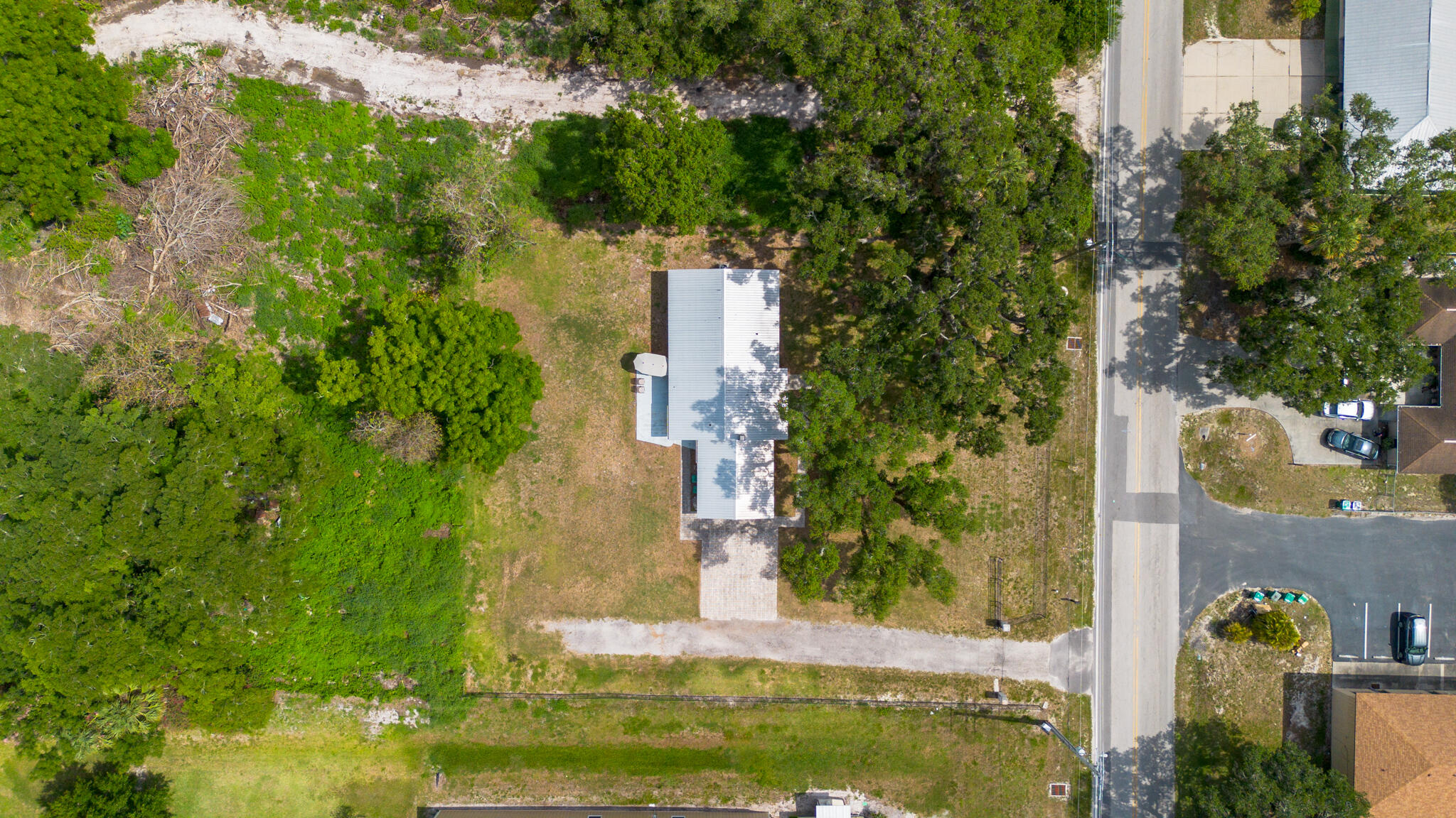 2675 Southwest 24th Avenue Okeechobee, FL 34974 - Photo 2 of 60 an aerial view of a house with a yard lake house and outdoor seating