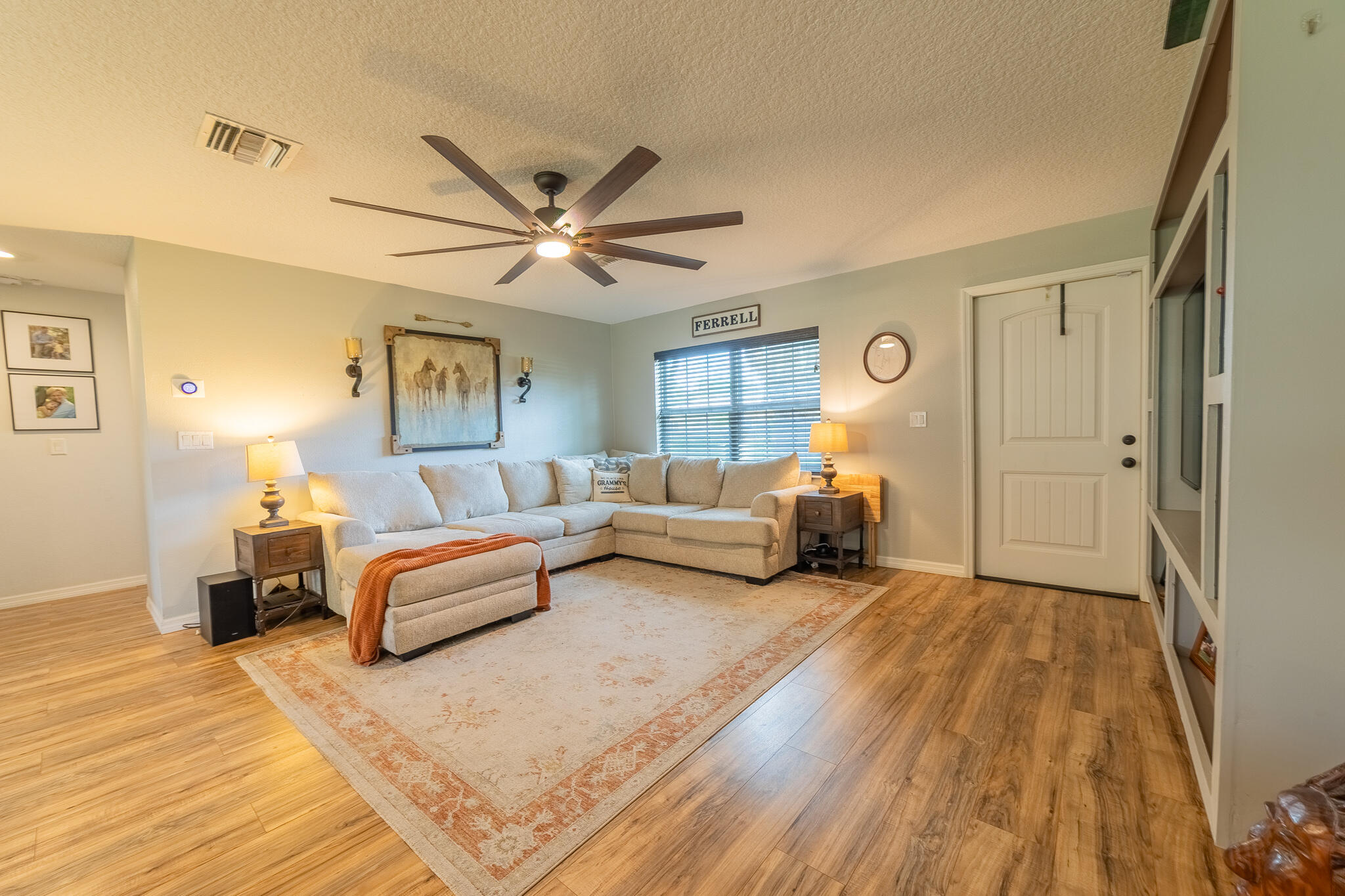 2675 Southwest 24th Avenue Okeechobee, FL 34974 - Photo 32 of 60 a bed room with a bed and a chandelier