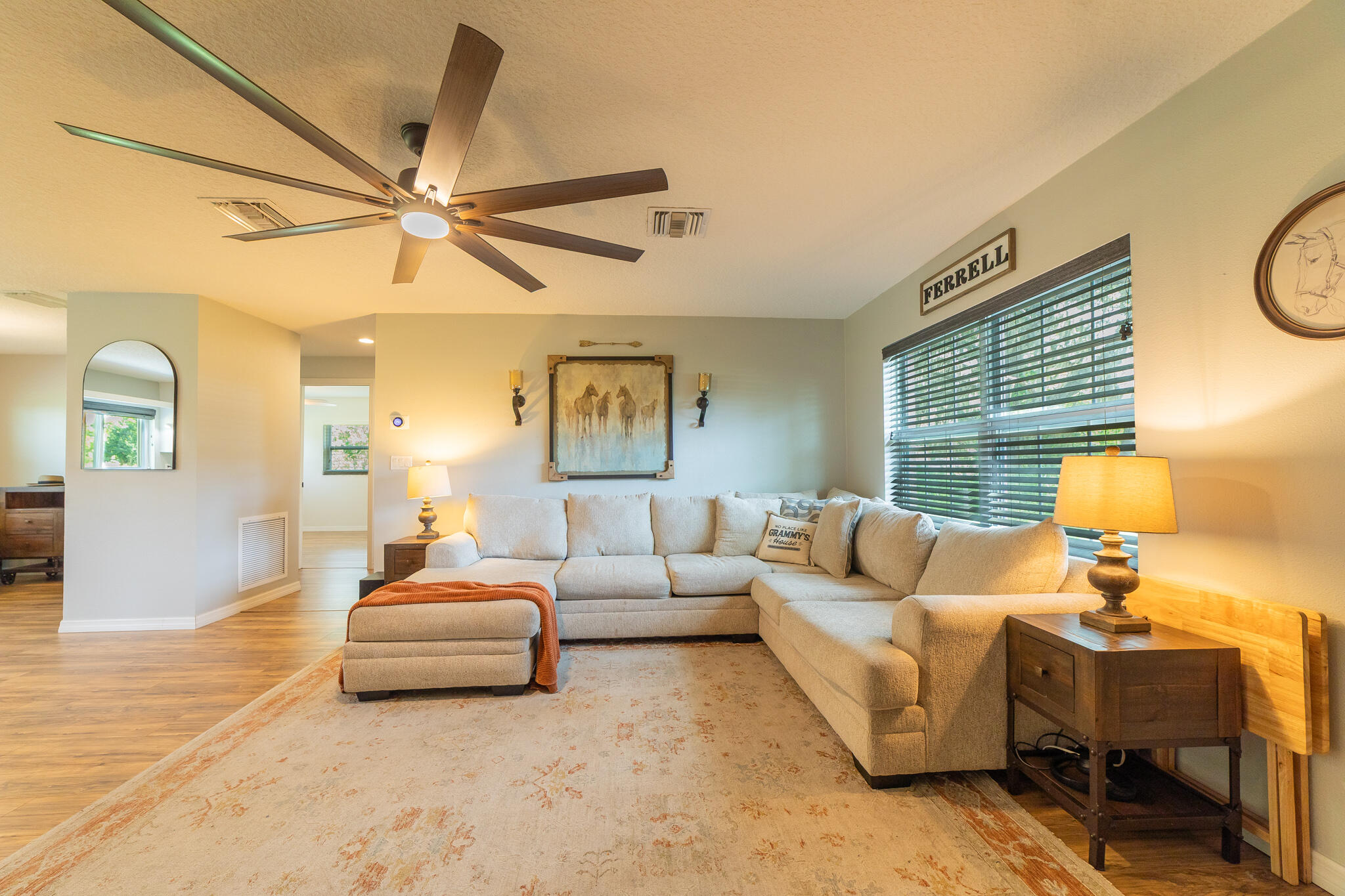2675 Southwest 24th Avenue Okeechobee, FL 34974 - Photo 34 of 60 a living room with furniture and a window