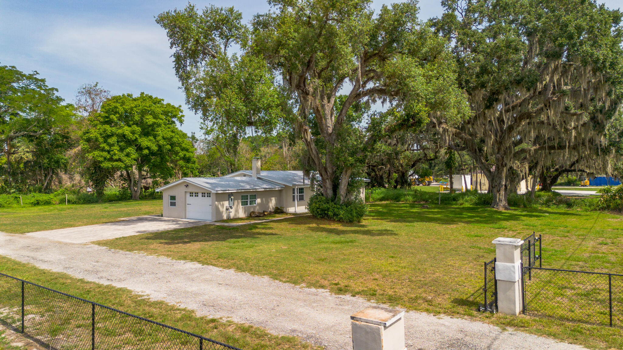 2675 Southwest 24th Avenue Okeechobee, FL 34974 - Photo 4 of 60 a view of a swimming pool with a garden