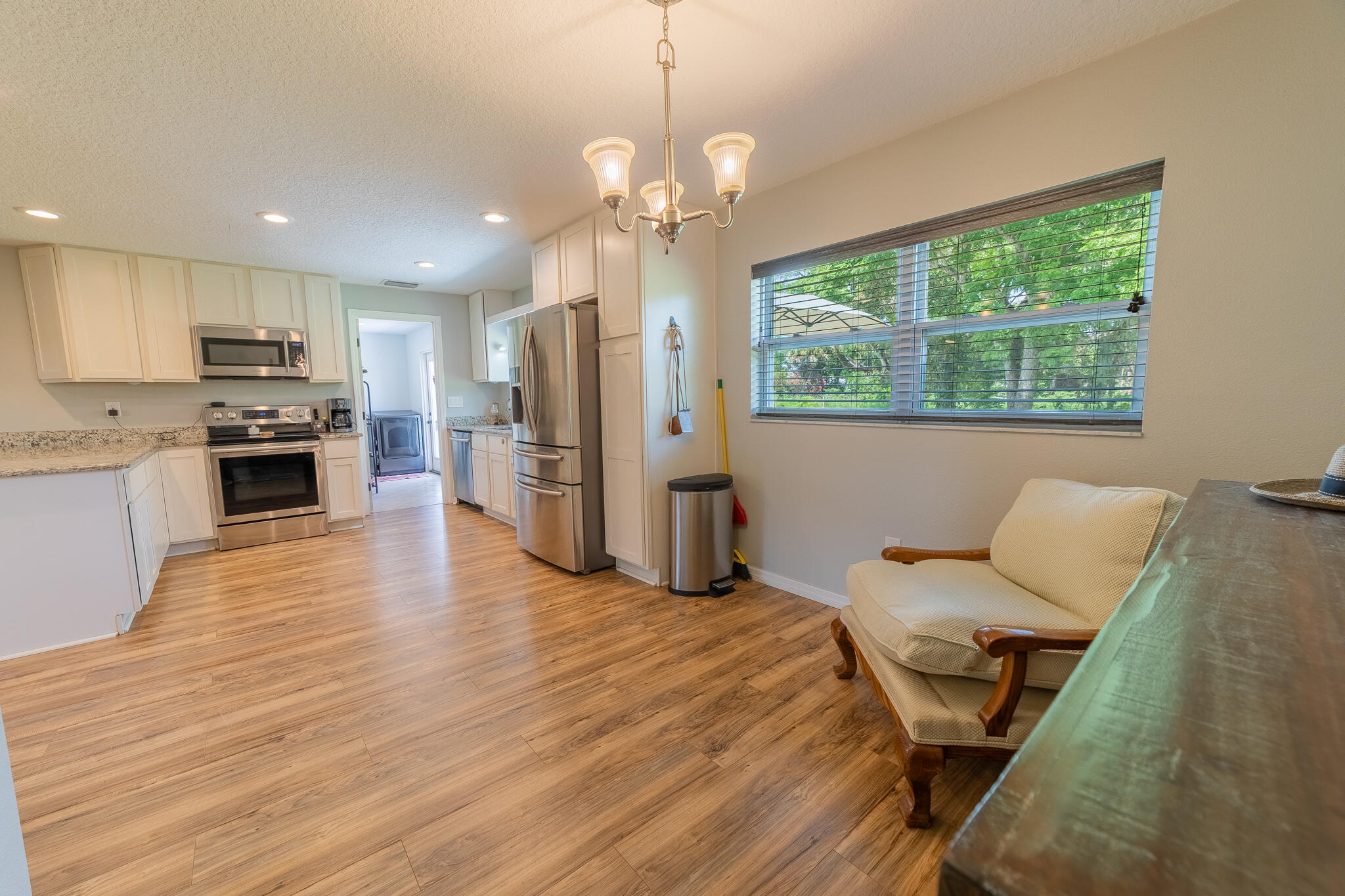2675 Southwest 24th Avenue Okeechobee, FL 34974 - Photo 42 of 60 a living room with furniture and a large window