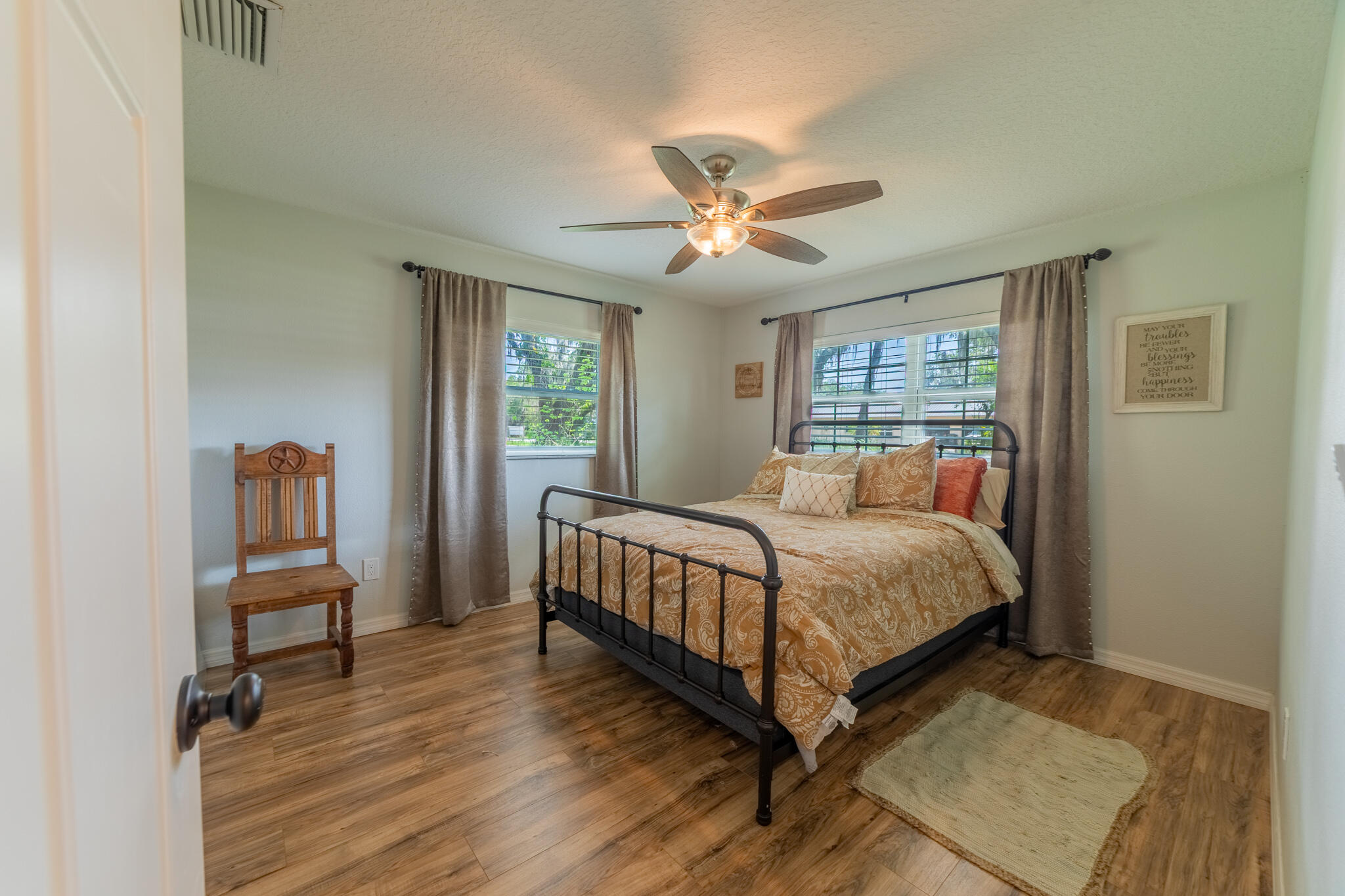 2675 Southwest 24th Avenue Okeechobee, FL 34974 - Photo 49 of 60 a bedroom with a bed and a window