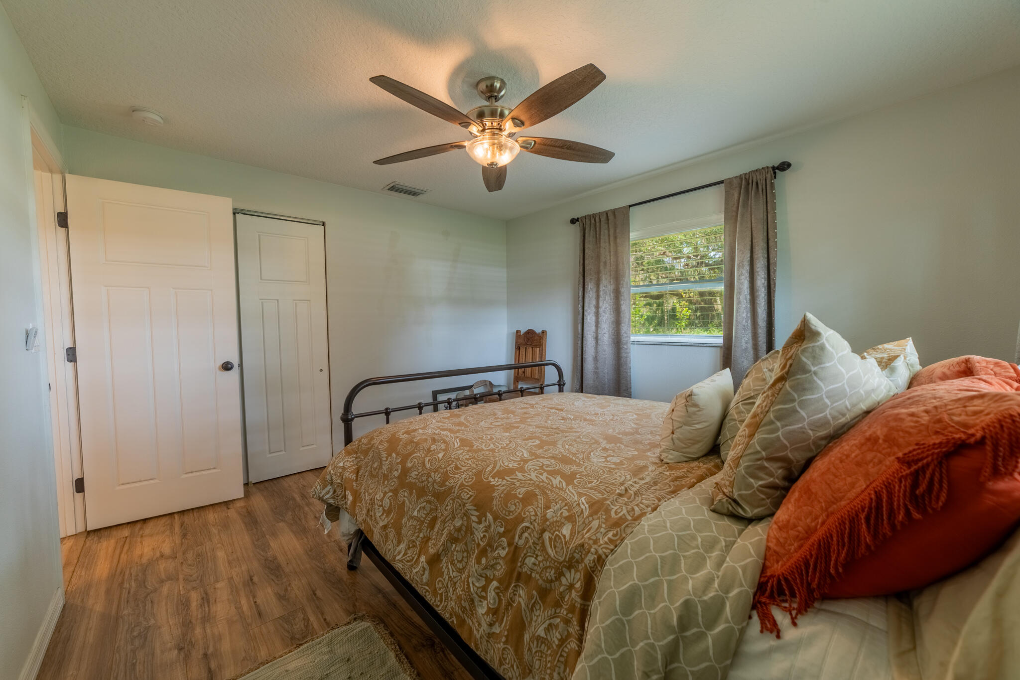 2675 Southwest 24th Avenue Okeechobee, FL 34974 - Photo 52 of 60 a bedroom with a bed and window
