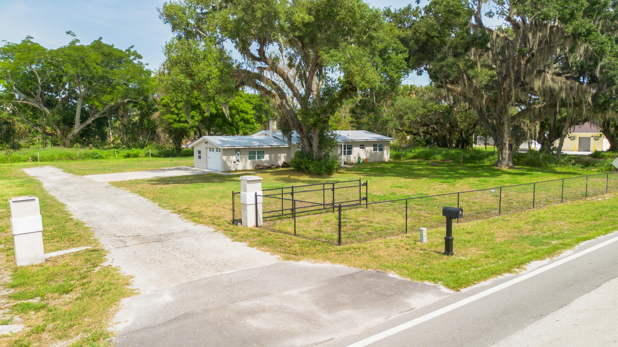 2675 Southwest 24th Avenue Okeechobee, FL 34974 - Photo 6 of 60 a view of a park with large trees