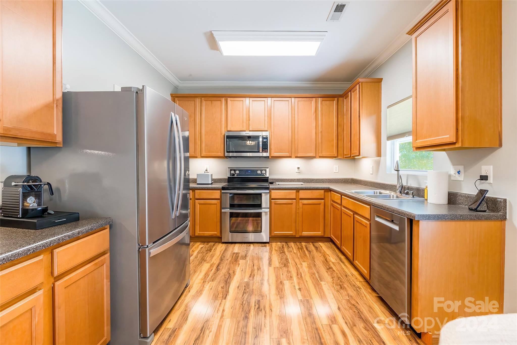 2901 Liddington Road Matthews, NC 28105 - Photo 12 of 37 a kitchen with granite countertop a refrigerator stove top oven and sink