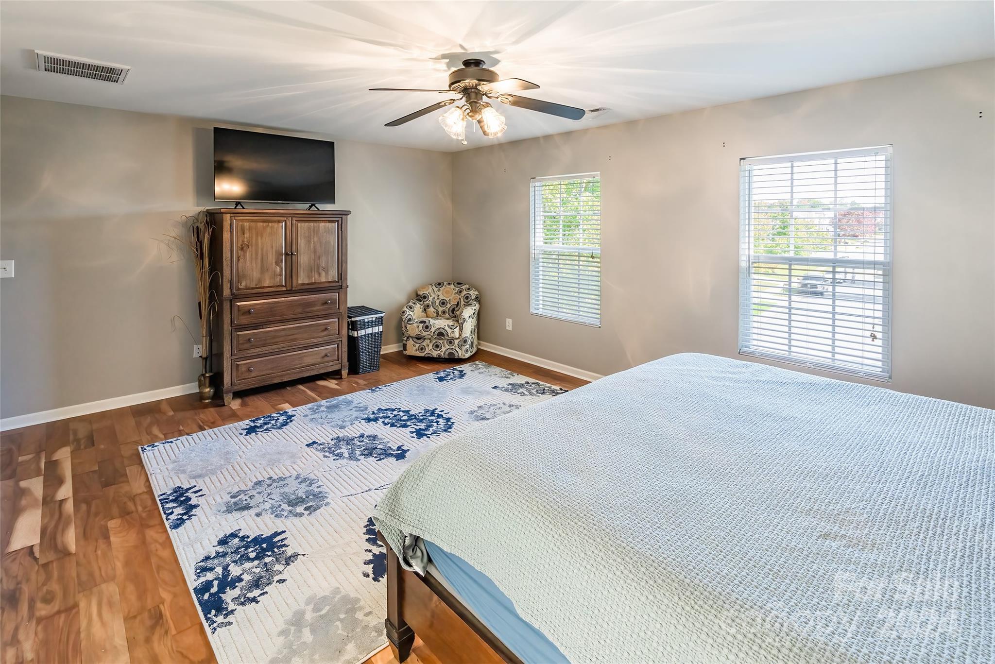 2901 Liddington Road Matthews, NC 28105 - Photo 20 of 37 a bedroom with a bed and a television