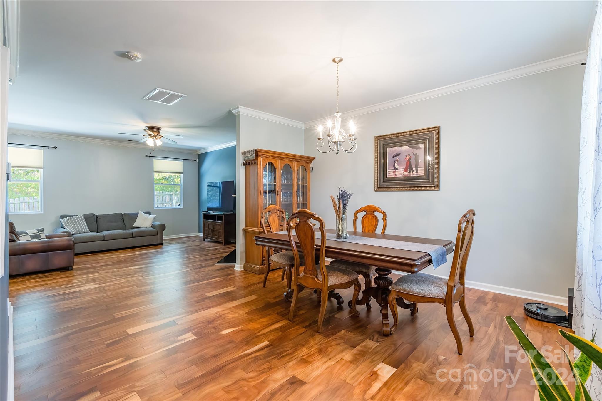 2901 Liddington Road Matthews, NC 28105 - Photo 5 of 37 a view of a dining room with furniture and wooden floor