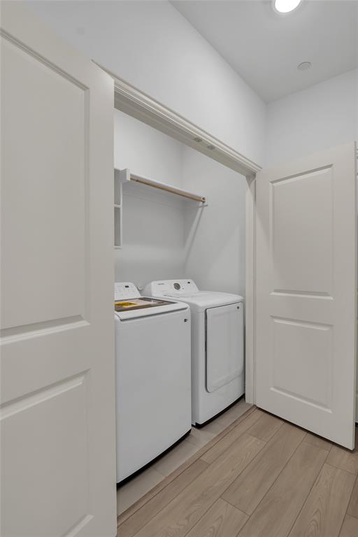 5258 Springlake Parkway Haltom City, TX 76117 - Photo 12 of 24 a utility room with dryer and washer