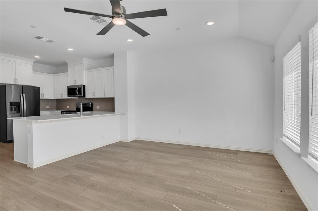 5258 Springlake Parkway Haltom City, TX 76117 - Photo 14 of 24 a view of a kitchen with electric appliances