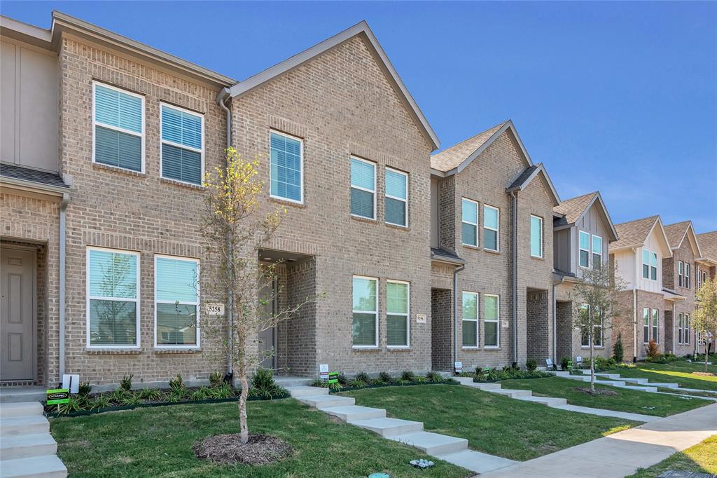 5258 Springlake Parkway Haltom City, TX 76117 - Photo 2 of 24 a front view of a house with a yard