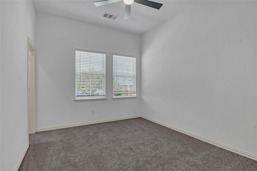 5258 Springlake Parkway Haltom City, TX 76117 - Photo 21 of 24 an empty room with a window