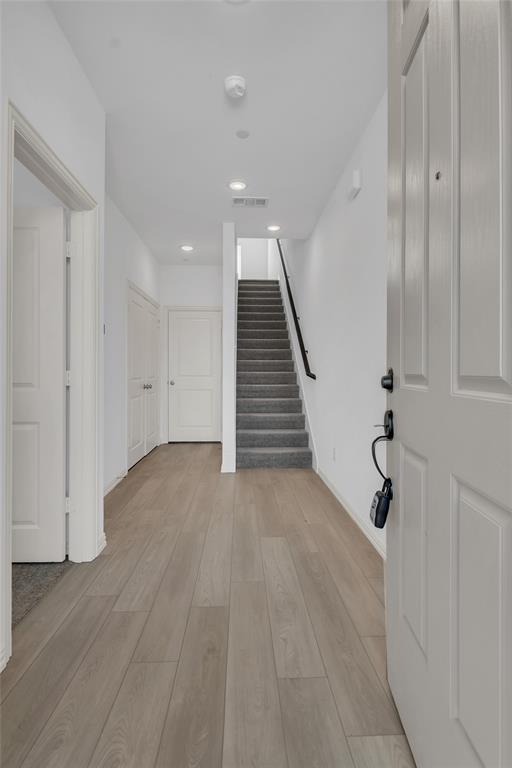 5258 Springlake Parkway Haltom City, TX 76117 - Photo 4 of 24 a view of an entryway with wooden floor