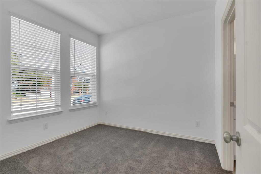 5258 Springlake Parkway Haltom City, TX 76117 - Photo 7 of 24 an empty room with a window