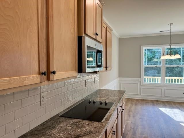 378 Lowery Lane Benson, NC 27504 - Photo 13 of 31 a kitchen with a sink stove and cabinets