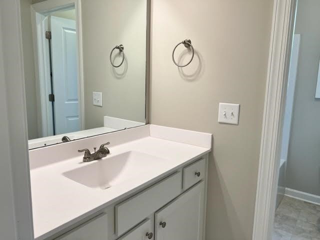 378 Lowery Lane Benson, NC 27504 - Photo 26 of 31 a bathroom with a sink and a mirror