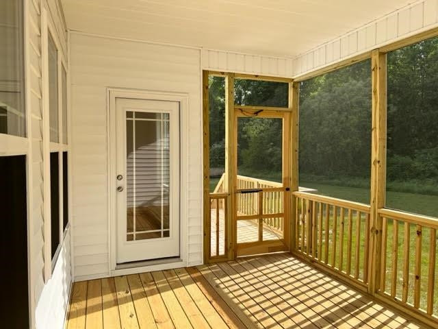 378 Lowery Lane Benson, NC 27504 - Photo 28 of 31 a view of a balcony with a potted plant