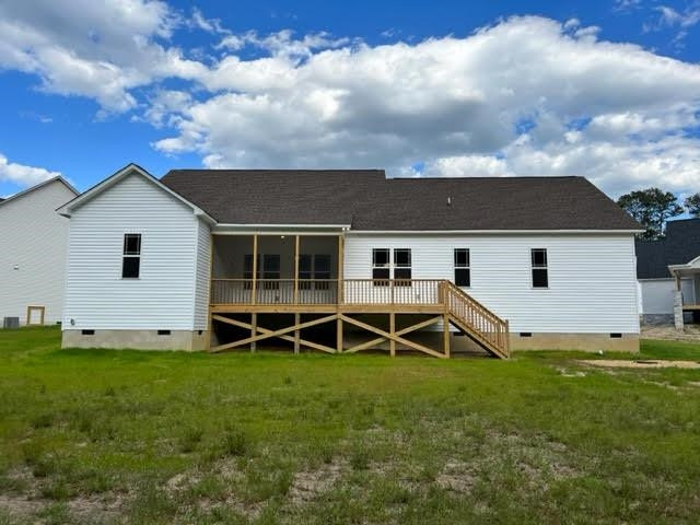 378 Lowery Lane Benson, NC 27504 - Photo 30 of 31 a view of a house with yard and garage