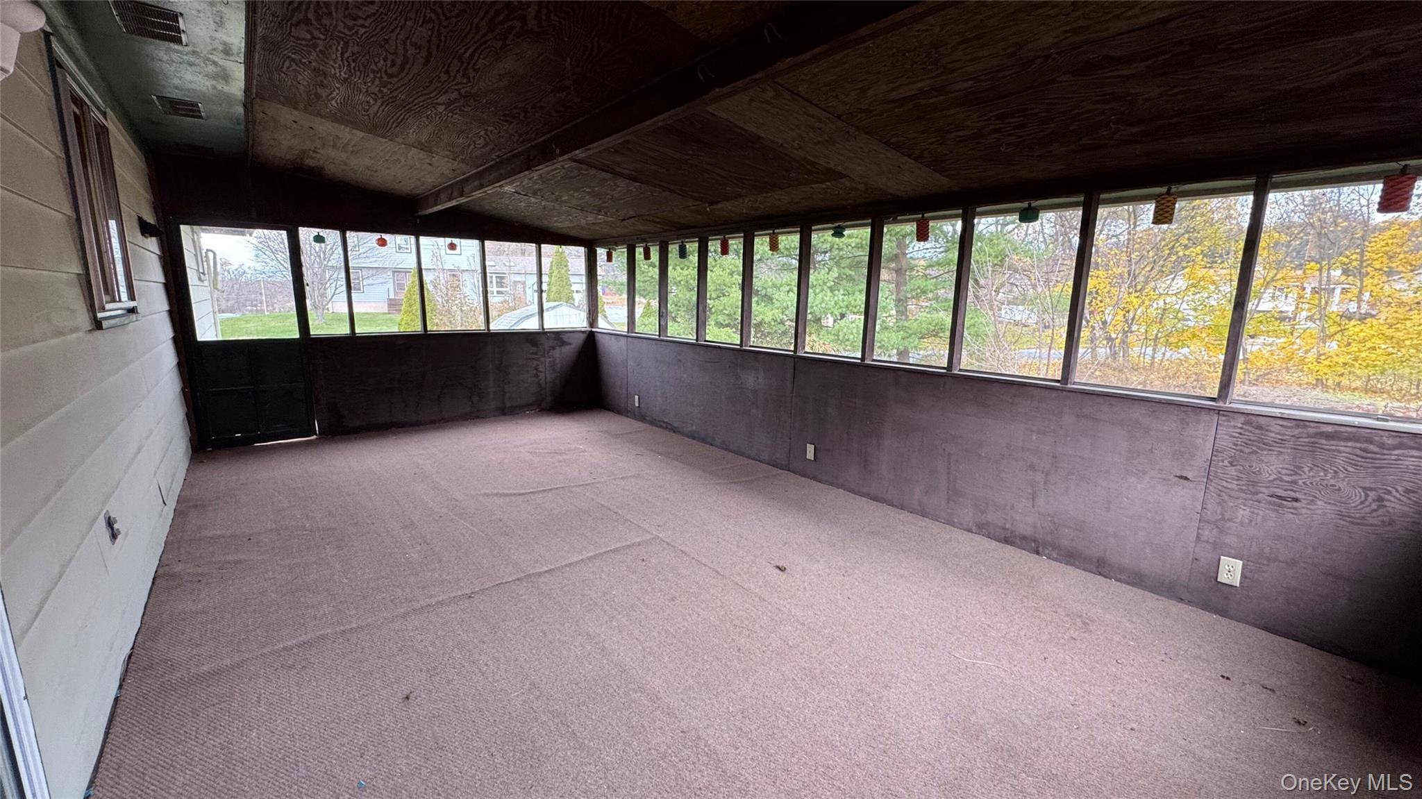 107 Noxon Road Poughkeepsie, NY 12603 - Photo 15 of 38 a view of room with large windows