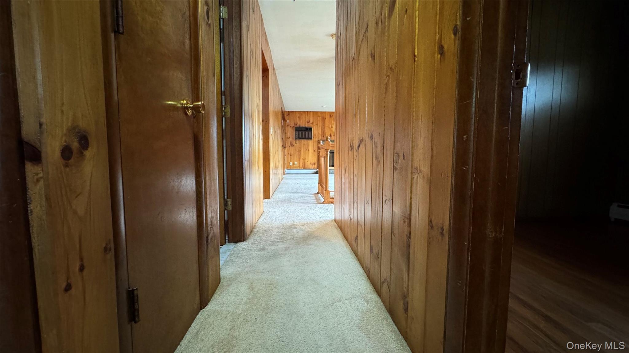 107 Noxon Road Poughkeepsie, NY 12603 - Photo 24 of 38 a view of a hallway with a wooden door