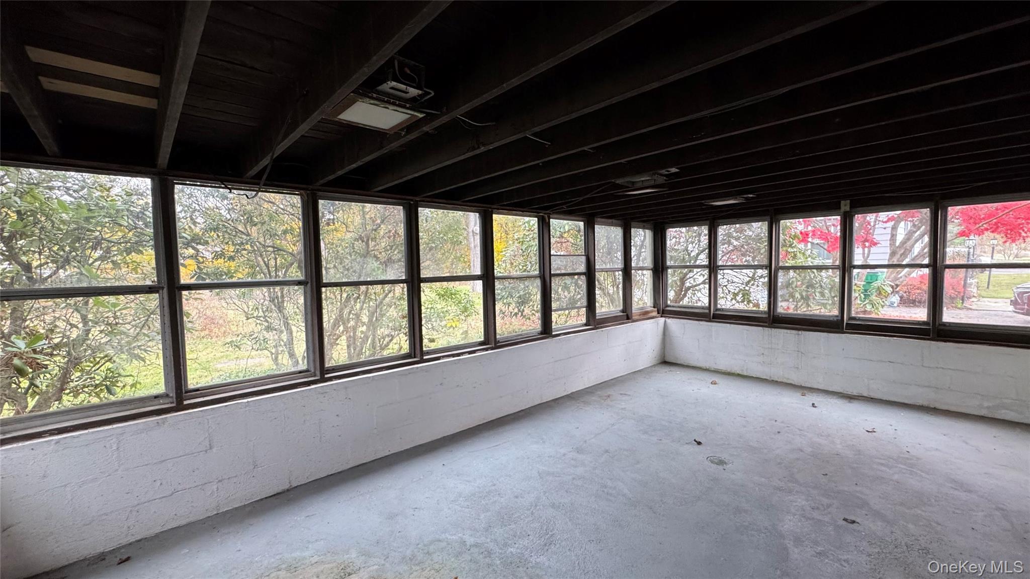 107 Noxon Road Poughkeepsie, NY 12603 - Photo 32 of 38 a view of an empty room with a window