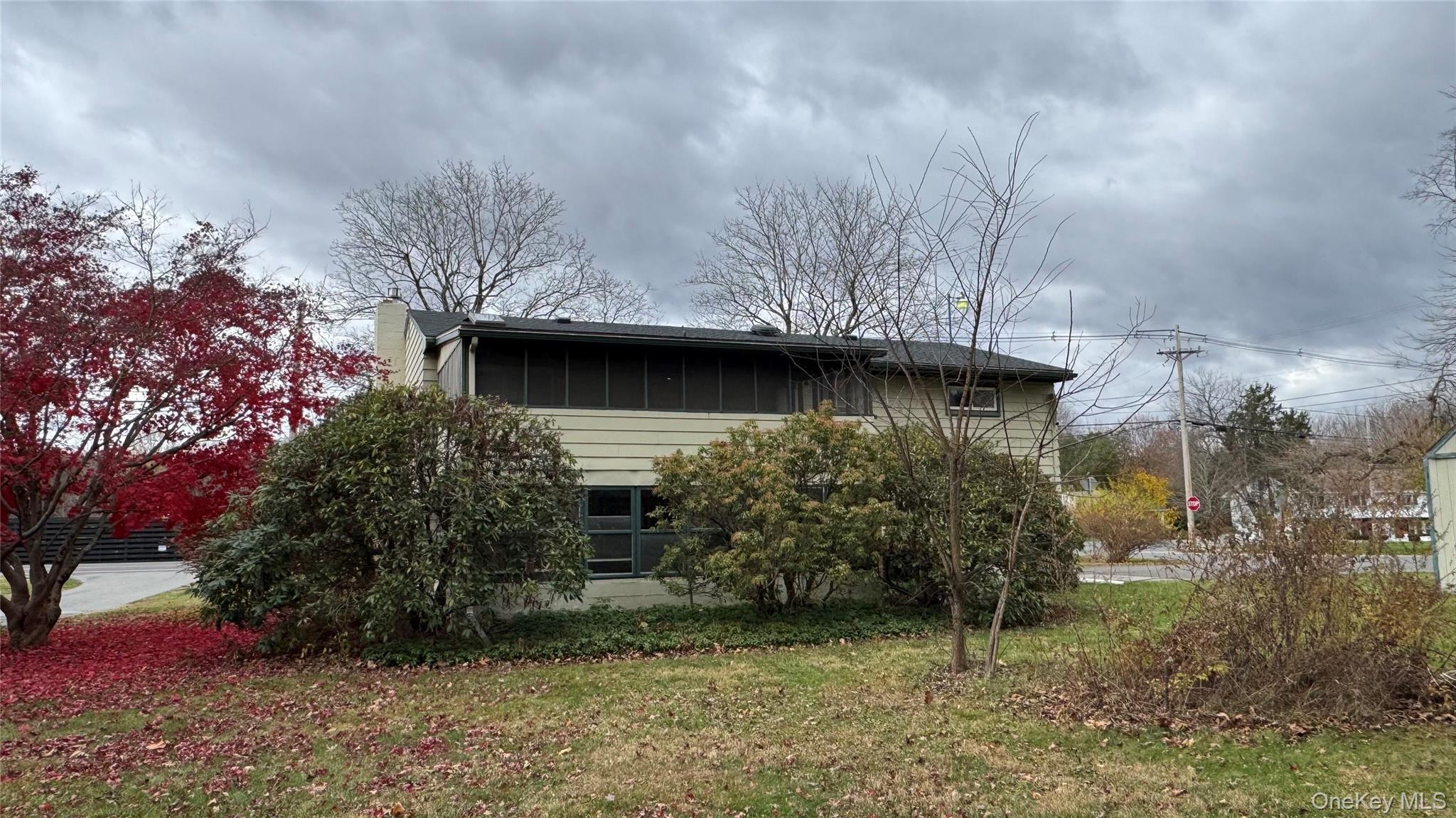 107 Noxon Road Poughkeepsie, NY 12603 - Photo 37 of 38 a view of back yard of the house