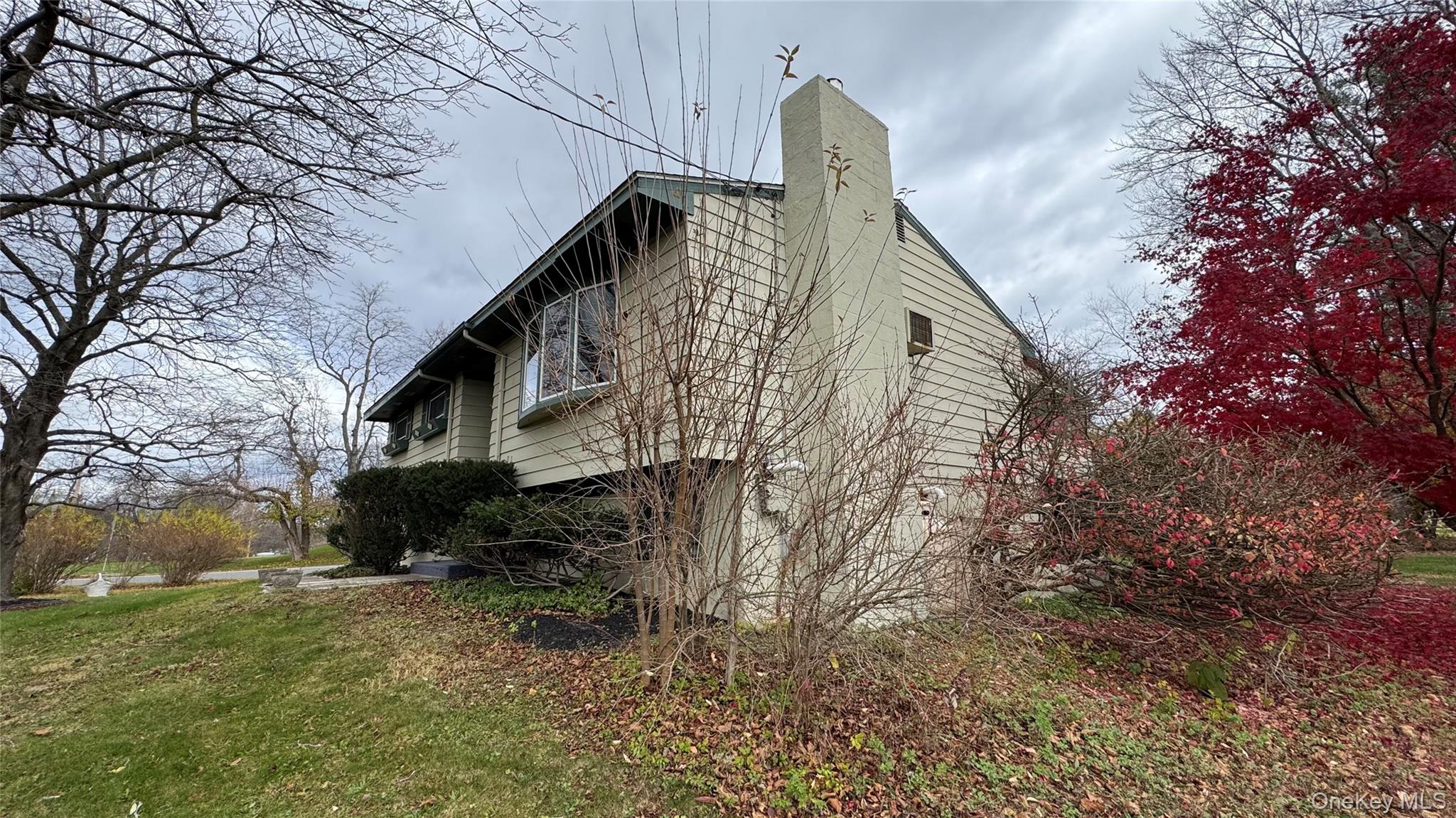 107 Noxon Road Poughkeepsie, NY 12603 - Photo 38 of 38 a backyard of a house with lots of green space