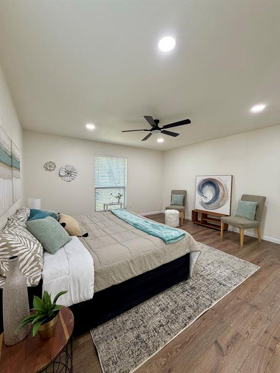 3609 Country Club Road Arlington, TX 76013 - Photo 22 of 40 a bedroom with a bed and a table