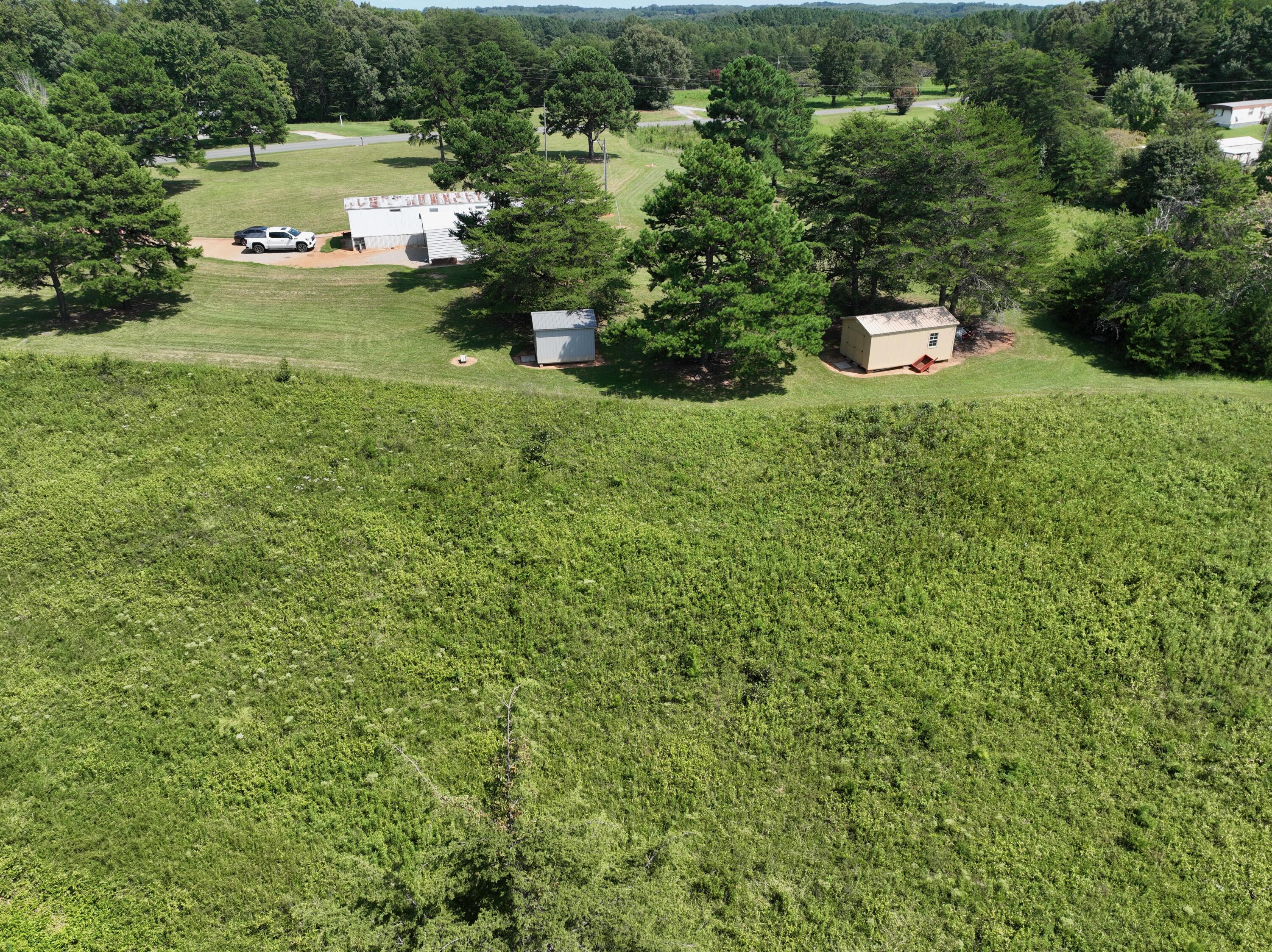 1494 Green Bay Road Chatham, VA 24531 - Photo 13 of 54 a view of a house with a yard