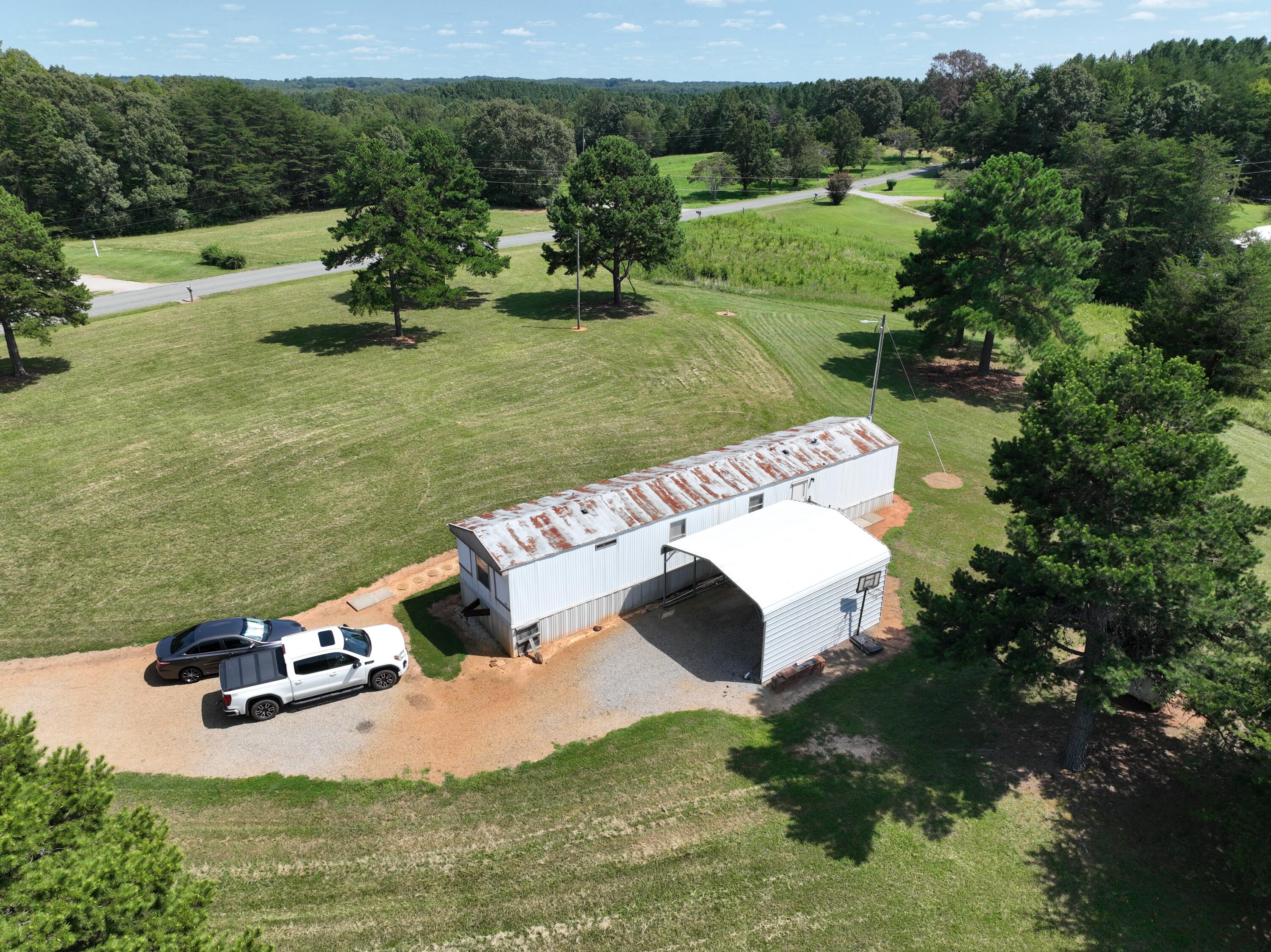 1494 Green Bay Road Chatham, VA 24531 - Photo 16 of 54 an aerial view of a house with yard