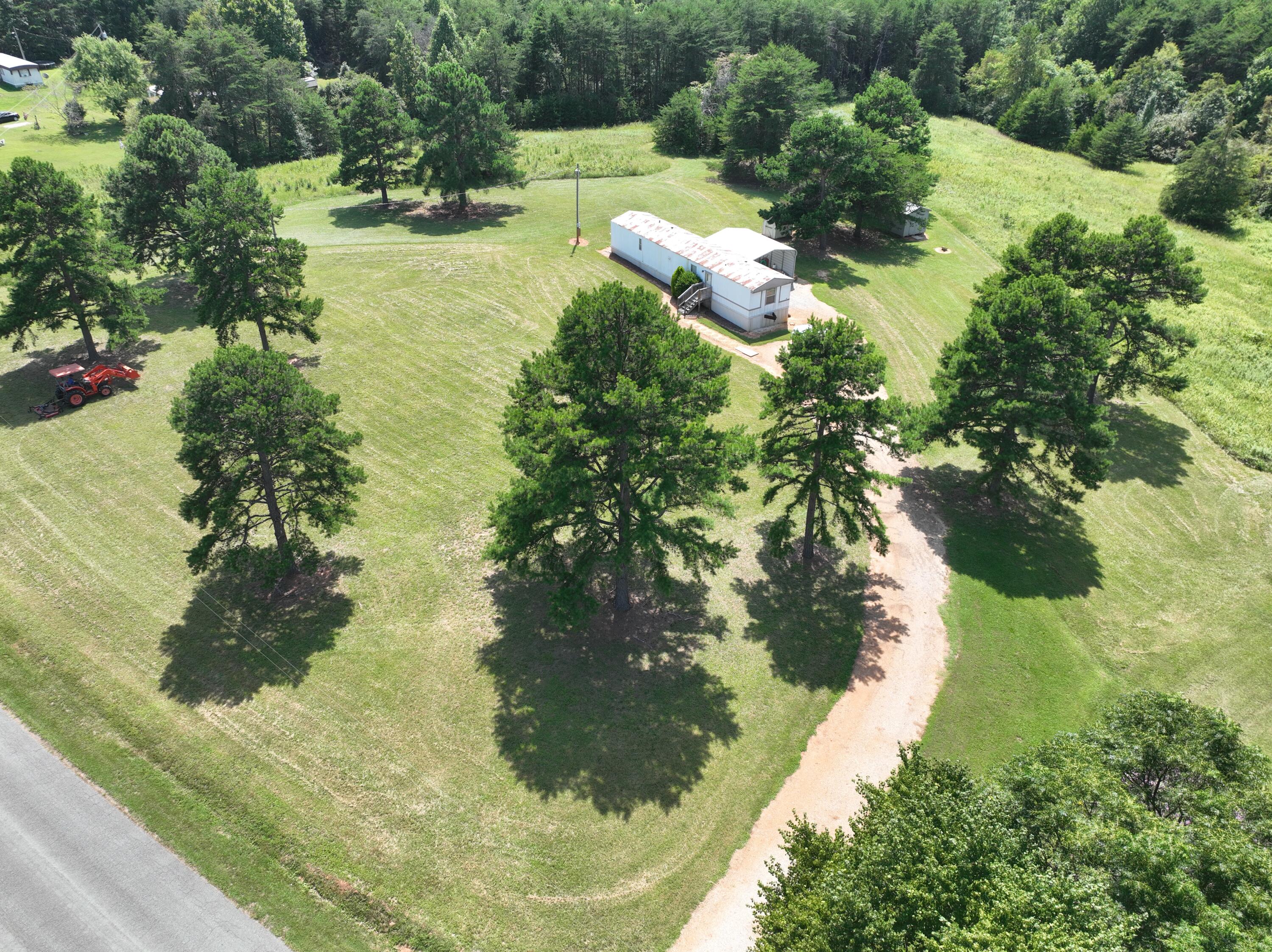 1494 Green Bay Road Chatham, VA 24531 - Photo 18 of 54 a view of a lake with large trees