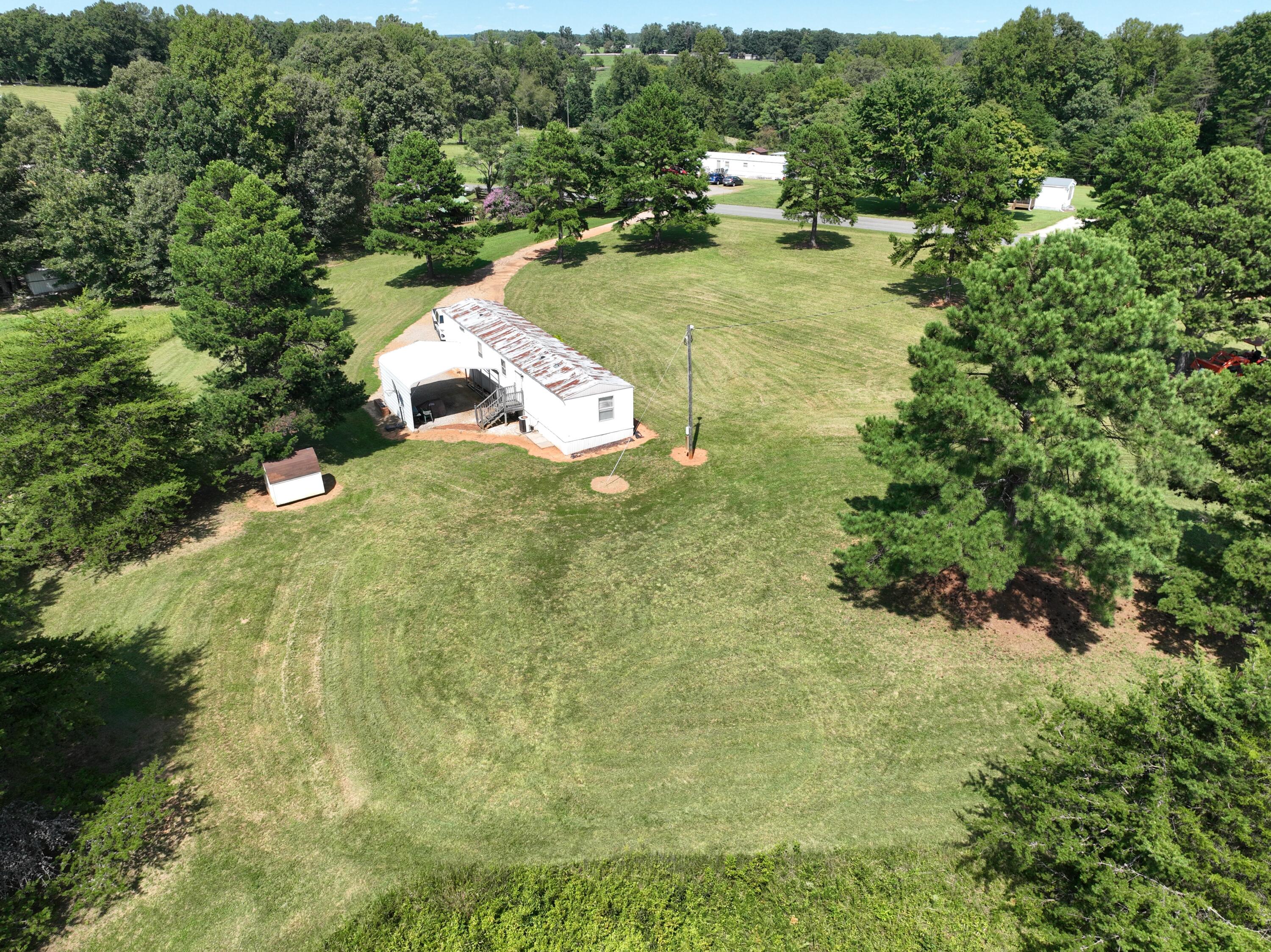 1494 Green Bay Road Chatham, VA 24531 - Photo 21 of 54 a view of a houses with yard