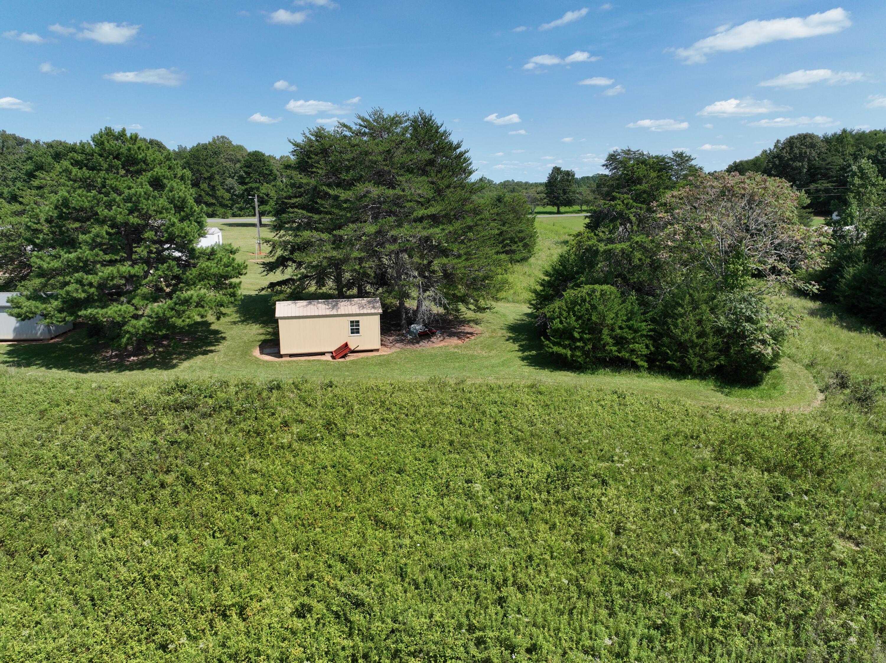 1494 Green Bay Road Chatham, VA 24531 - Photo 27 of 54 a aerial view of a house with a yard