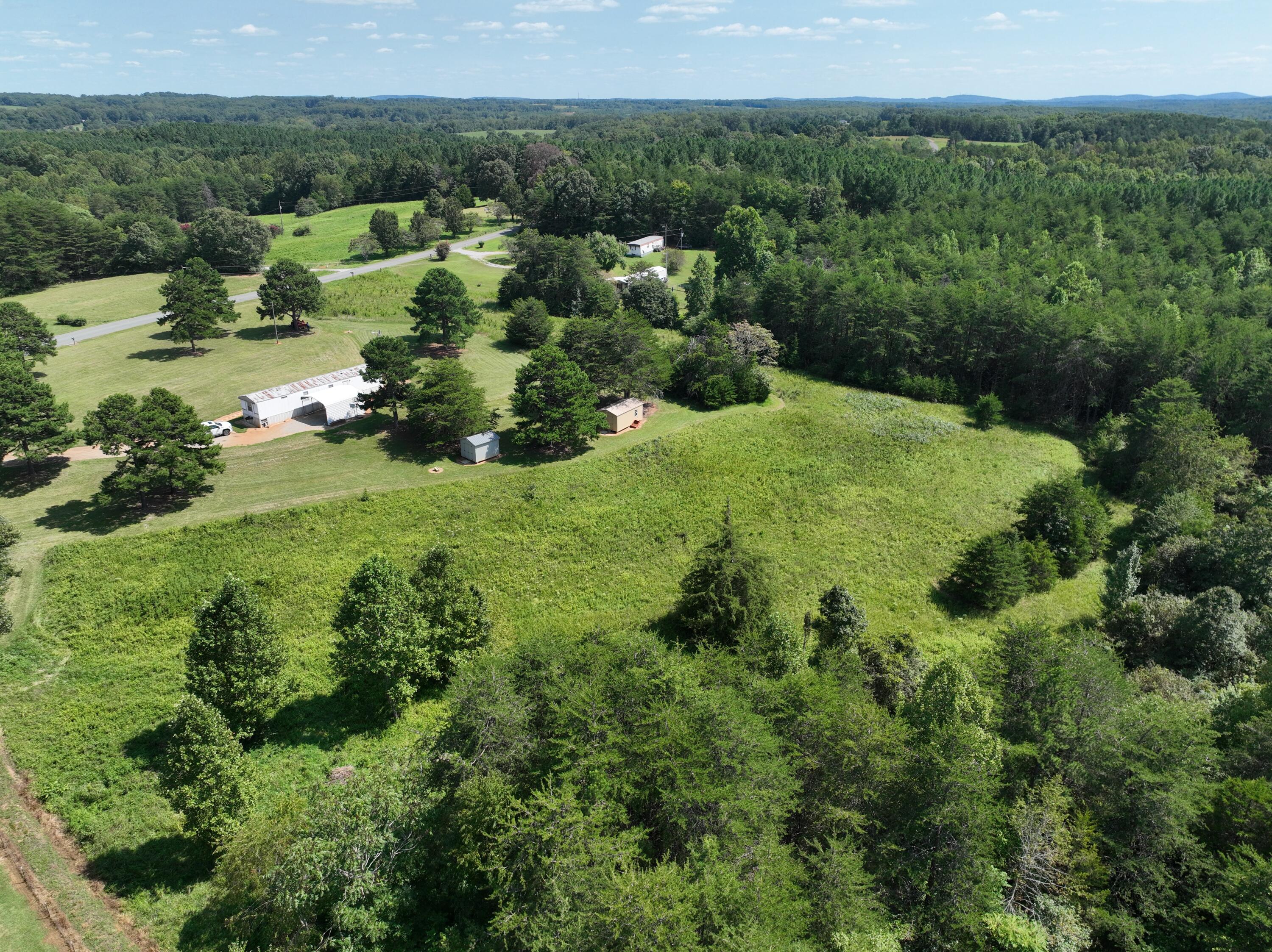 1494 Green Bay Road Chatham, VA 24531 - Photo 30 of 54 an aerial view of a house with a yard