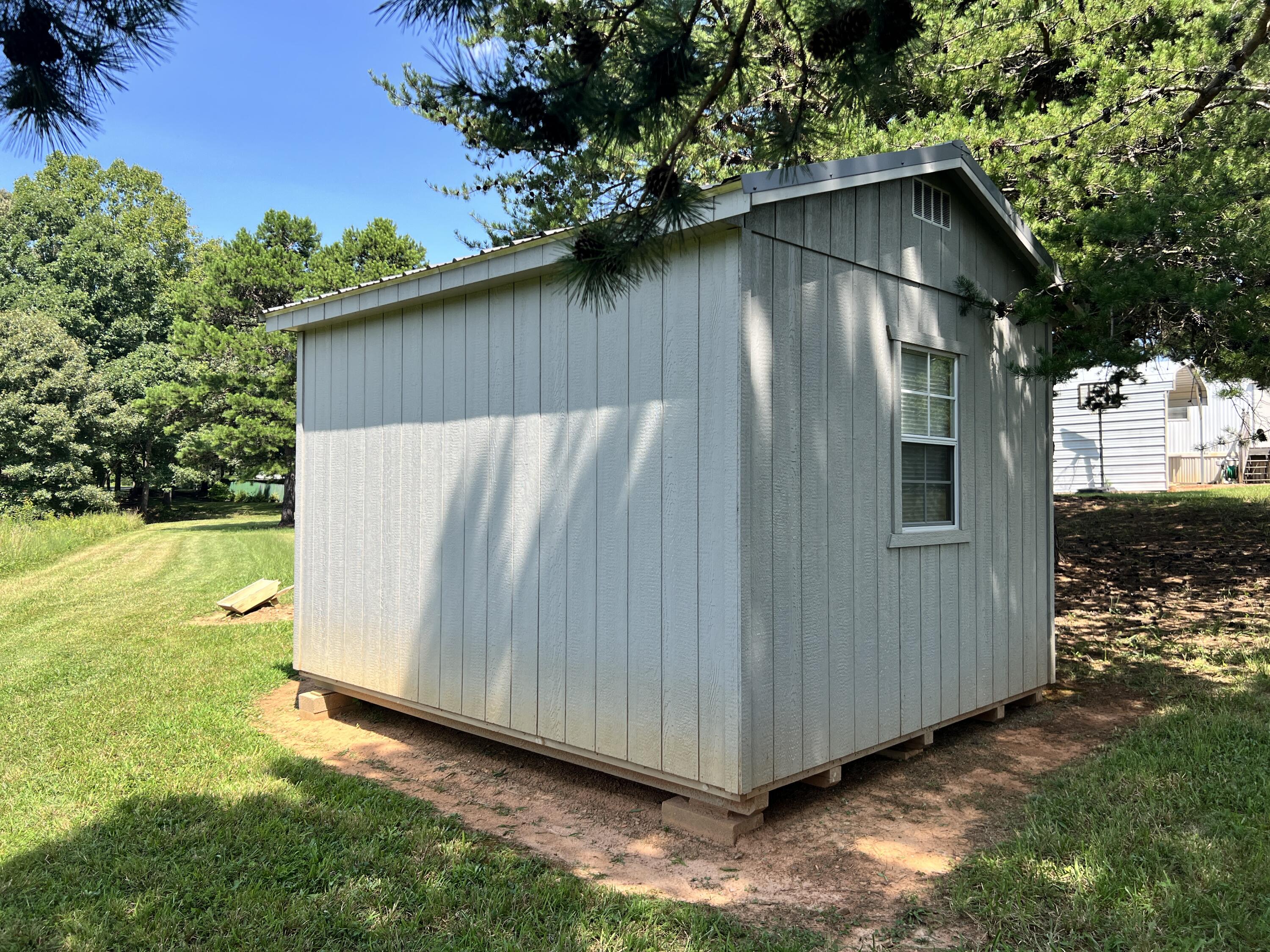 1494 Green Bay Road Chatham, VA 24531 - Photo 40 of 54 a view of backyard with tub and trees in the background