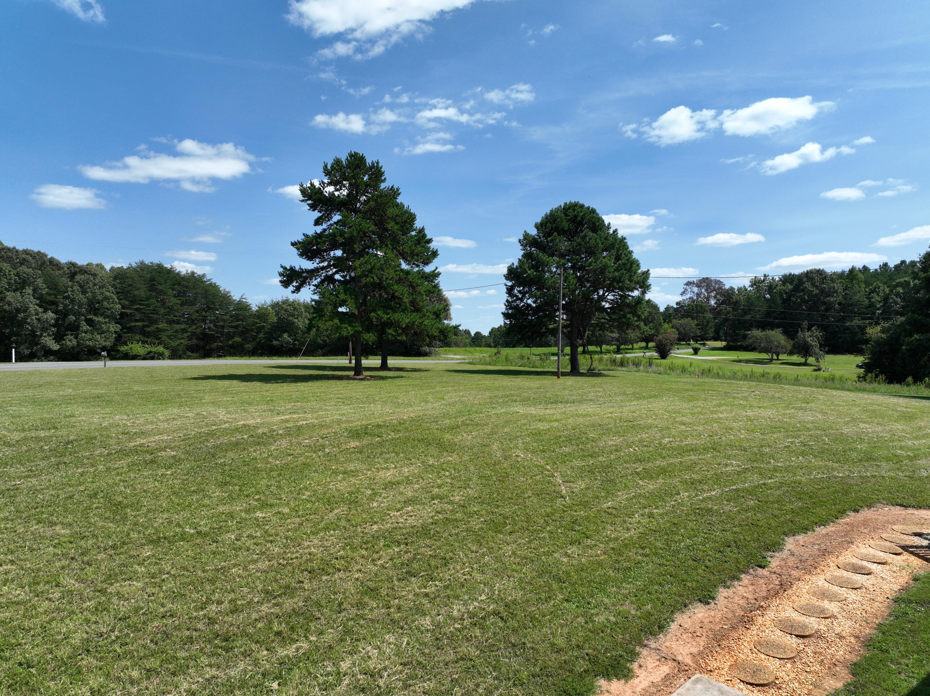 1494 Green Bay Road Chatham, VA 24531 - Photo 4 of 54 a view of a golf course with a garden