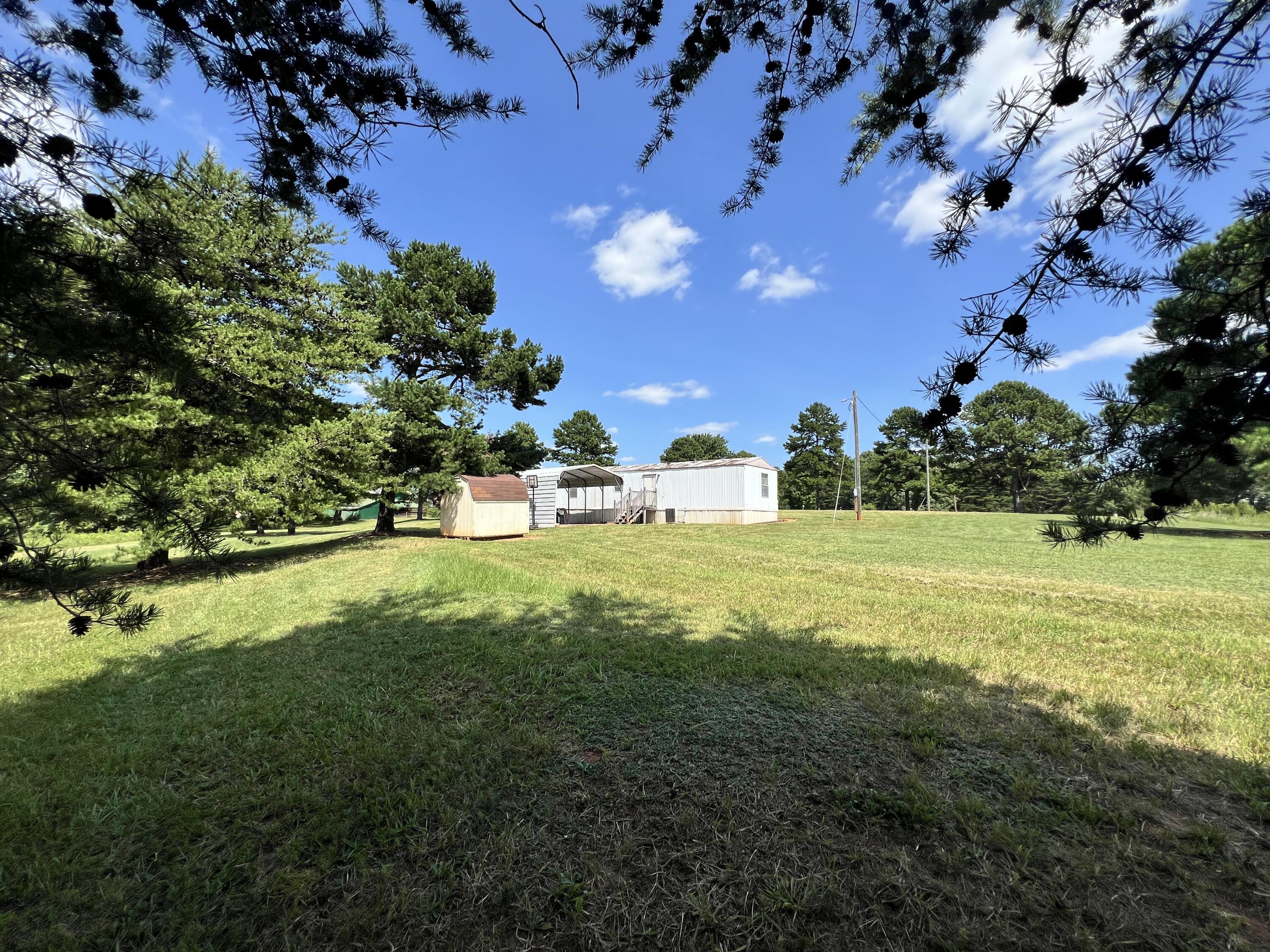 1494 Green Bay Road Chatham, VA 24531 - Photo 42 of 54 a view of a house with a backyard